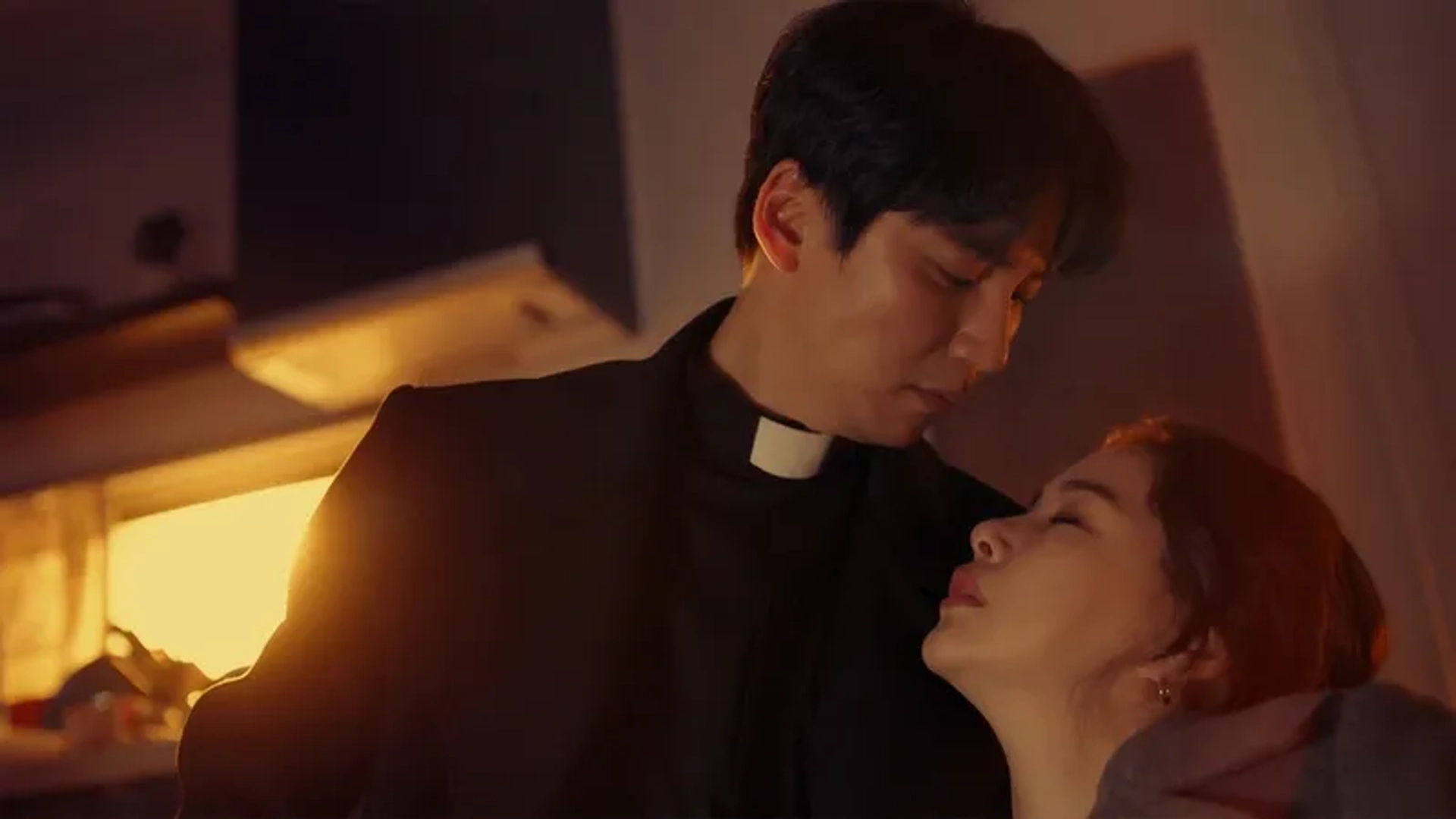 Kim Nam-gil and Lee Hanee in The Fiery Priest: Hae Il Saves Kyung Sun (2019)