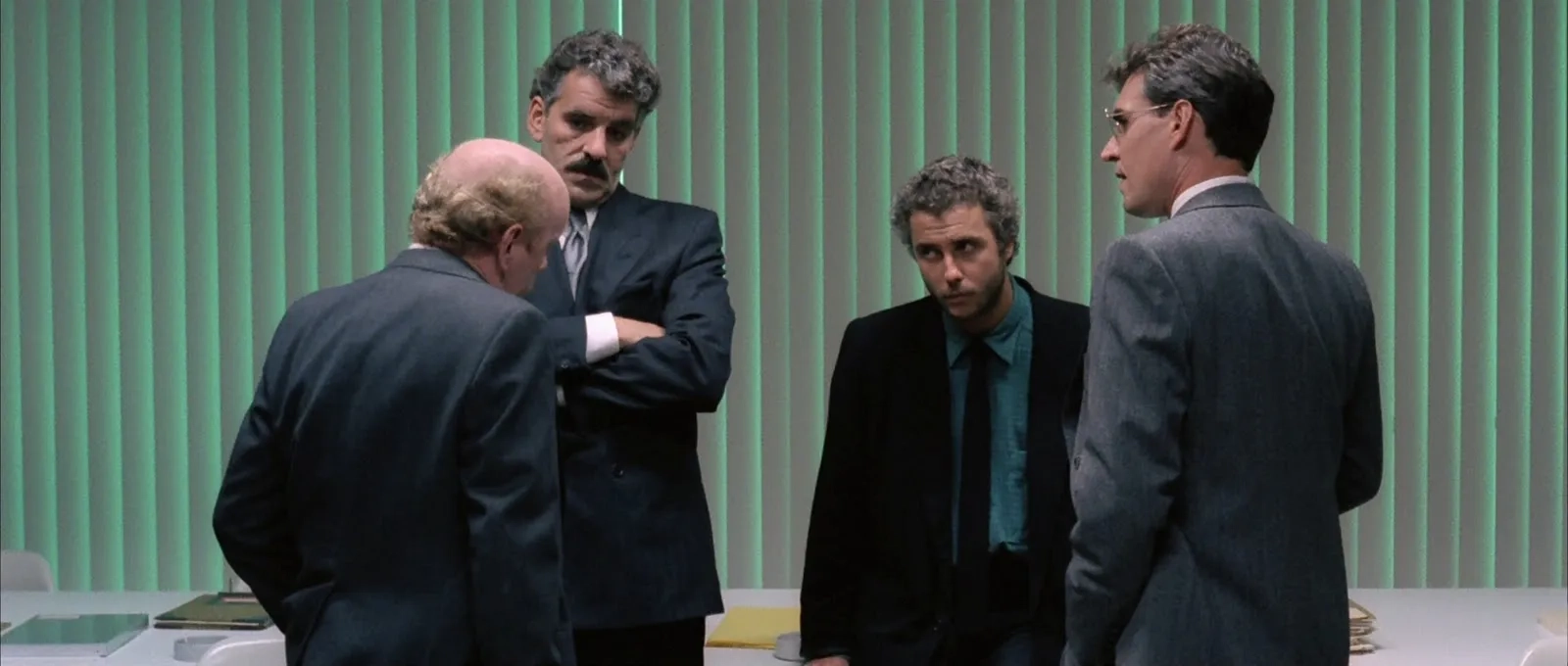Dennis Farina, Peter Maloney, William Petersen, and Norman Snow in Manhunter (1986)