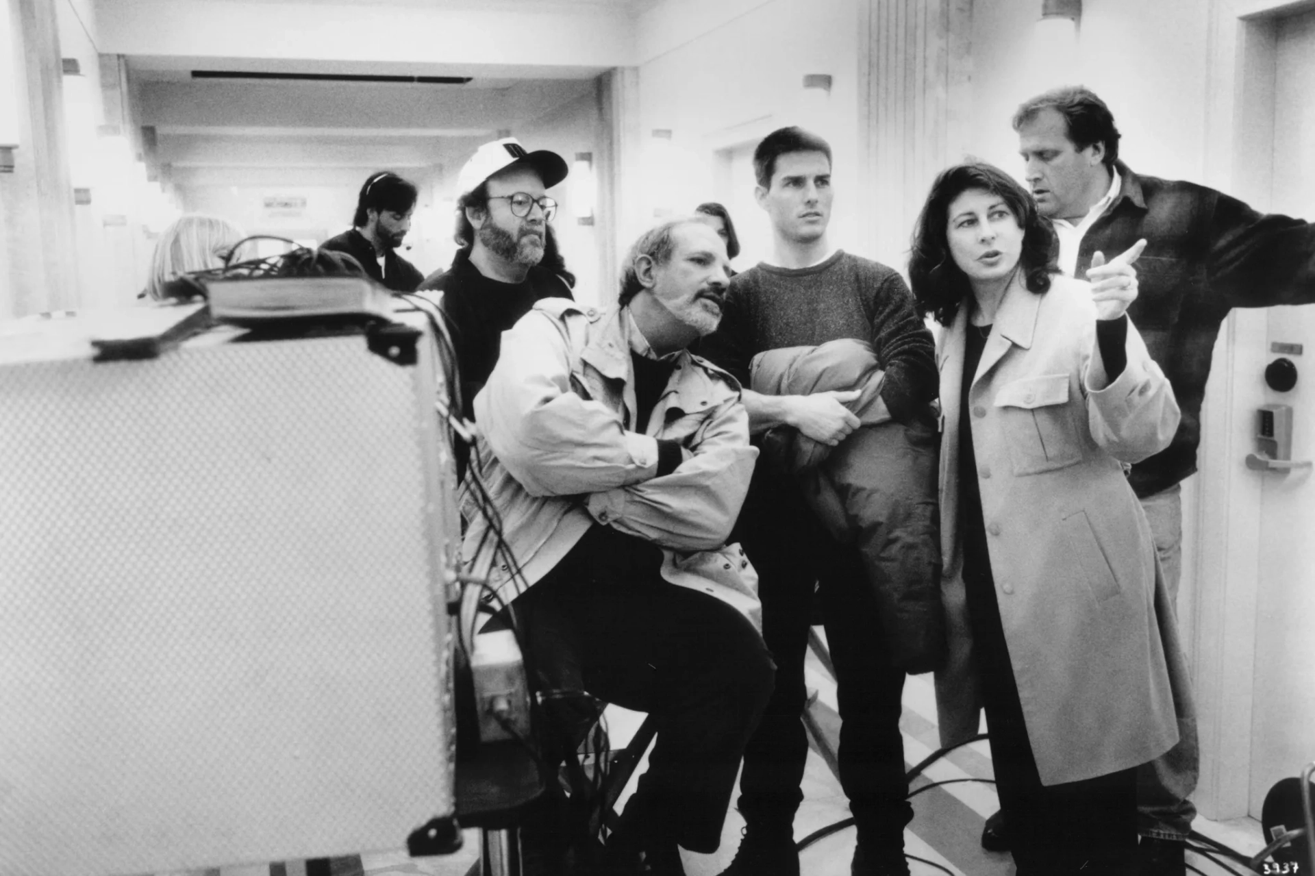 Tom Cruise, Brian De Palma, and Paula Wagner in Mission: Impossible (1996)