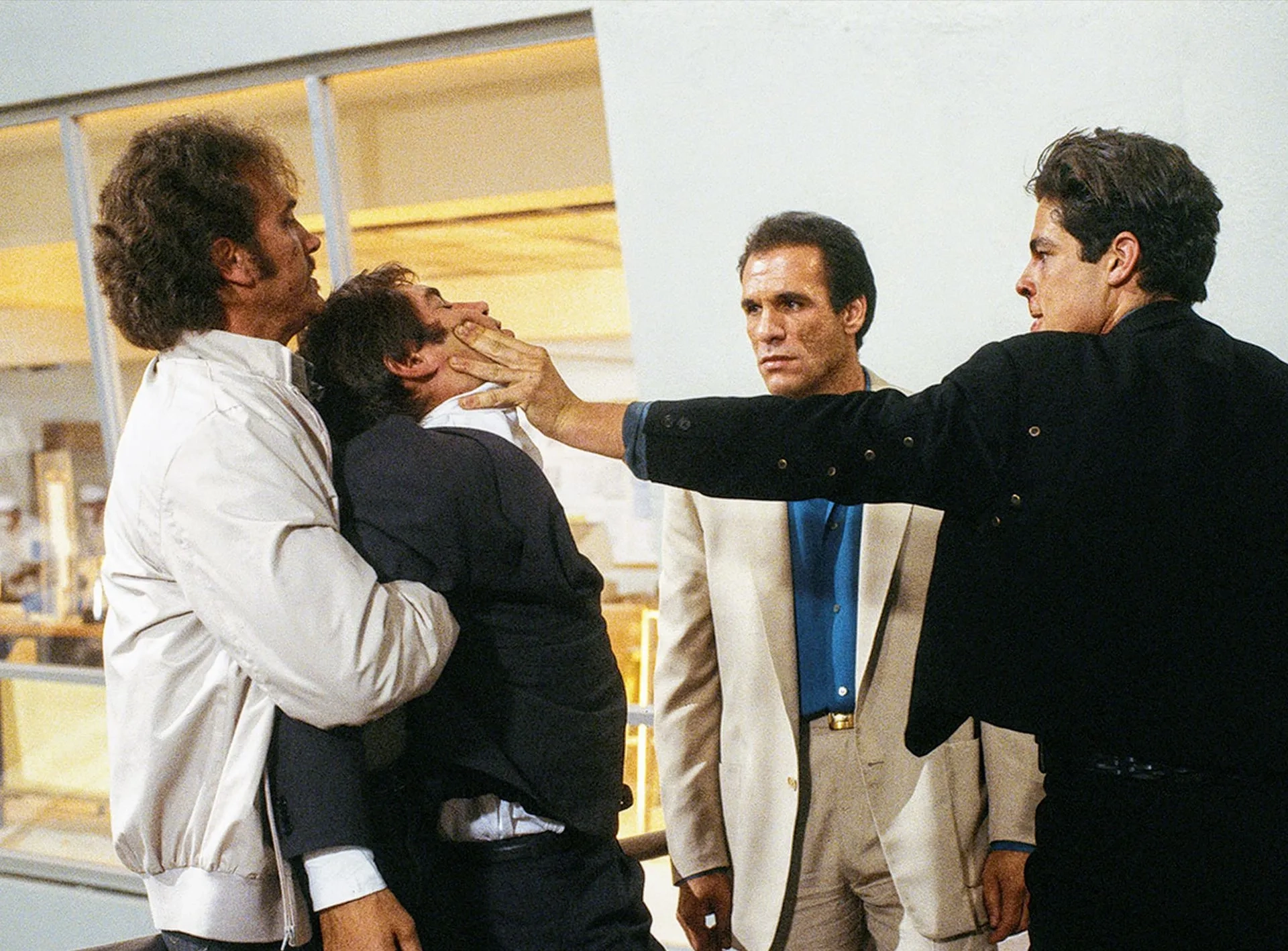 Timothy Dalton, Robert Davi, and Benicio Del Toro in Licence to Kill (1989)