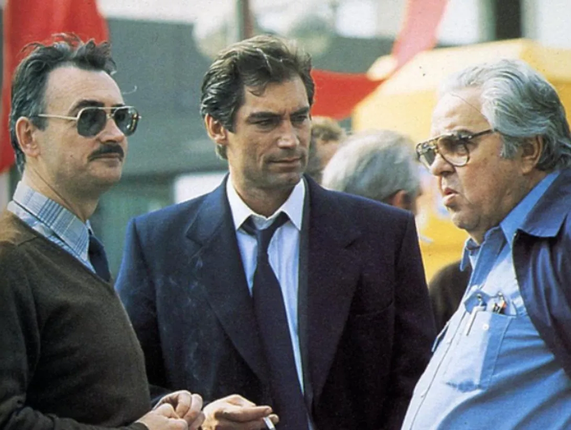 Timothy Dalton, Albert R. Broccoli, and Michael G. Wilson in The Living Daylights (1987)