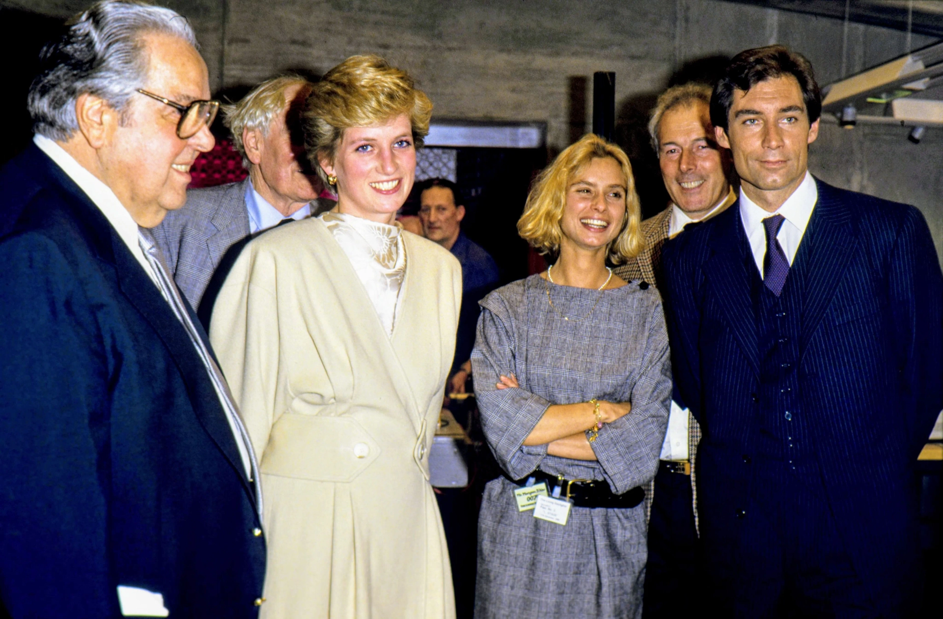 Timothy Dalton, Maryam d'Abo, Desmond Llewelyn, Albert R. Broccoli, John Glen, and Princess Diana in The Living Daylights (1987)