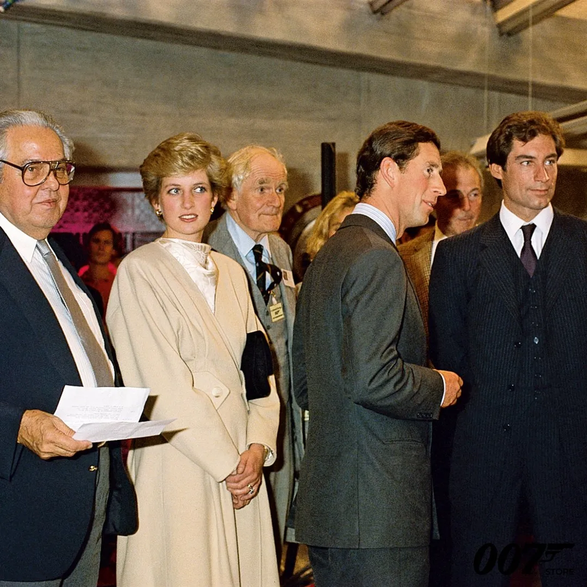 Timothy Dalton, Desmond Llewelyn, Albert R. Broccoli, John Glen, King Charles III, and Princess Diana in The Living Daylights (1987)