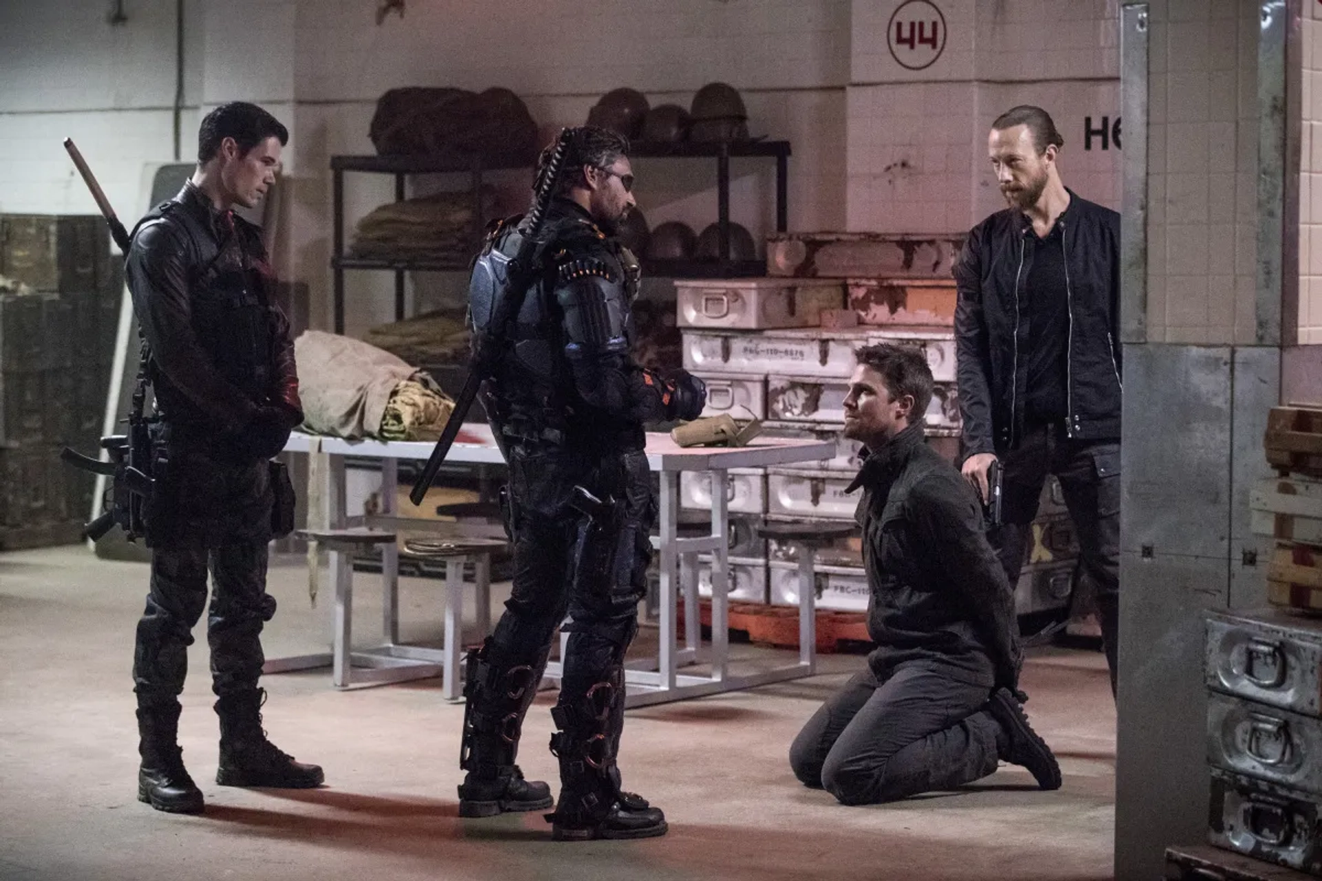 Manu Bennett, Kris Holden-Ried, Stephen Amell, and Liam Hall in Arrow (2012)