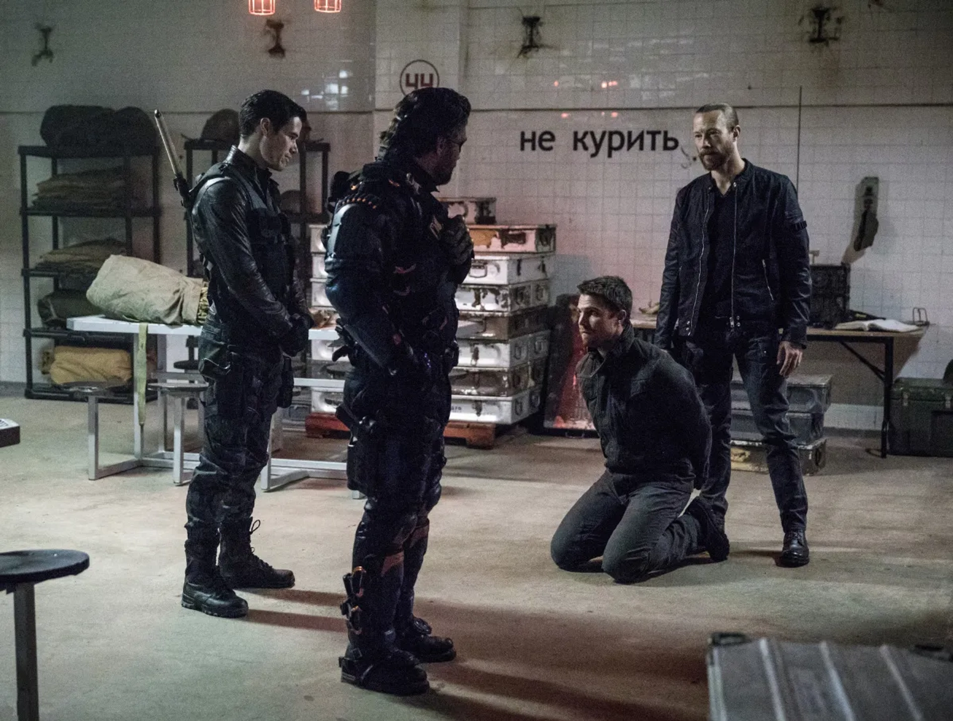 Manu Bennett, Kris Holden-Ried, Stephen Amell, and Liam Hall in Arrow (2012)