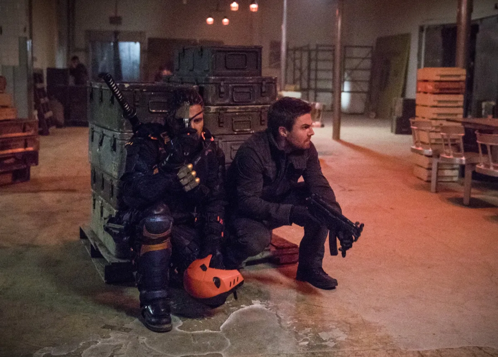 Manu Bennett and Stephen Amell in Arrow (2012)