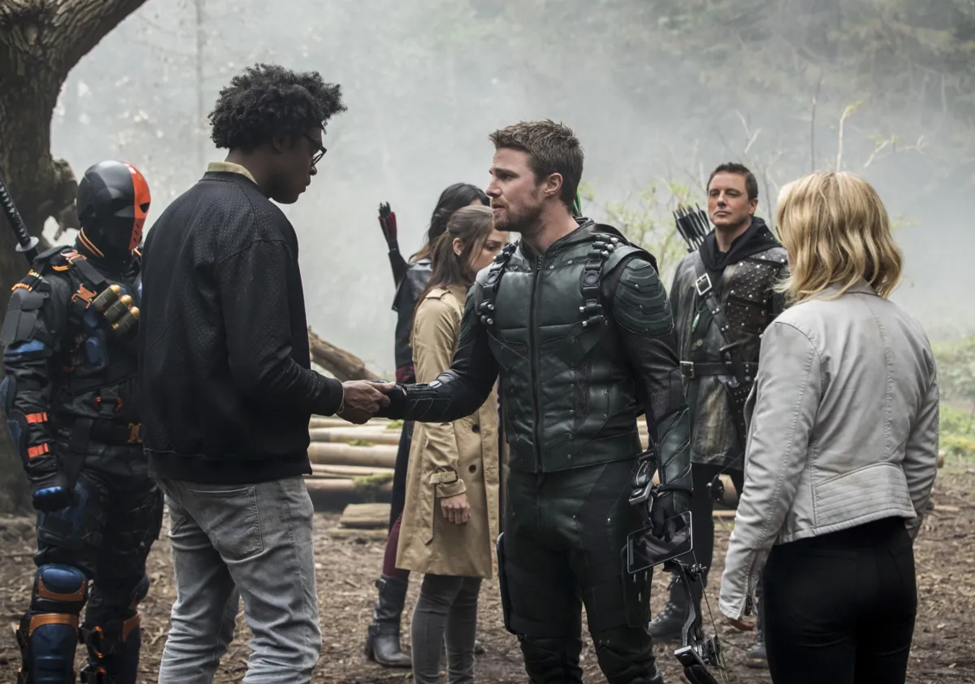 John Barrowman, Manu Bennett, Katrina Law, Stephen Amell, Anna Hopkins, Echo Kellum, and Emily Bett Rickards in Arrow (2012)