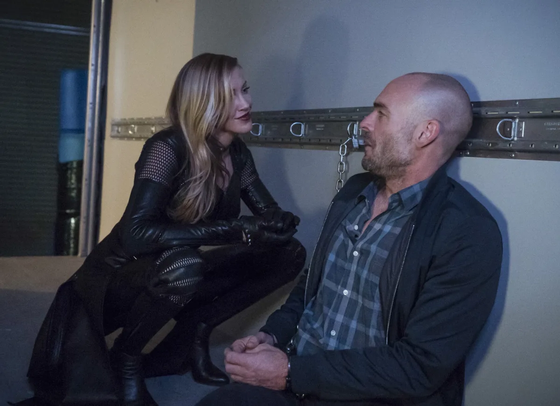 Paul Blackthorne and Katie Cassidy in Arrow (2012)