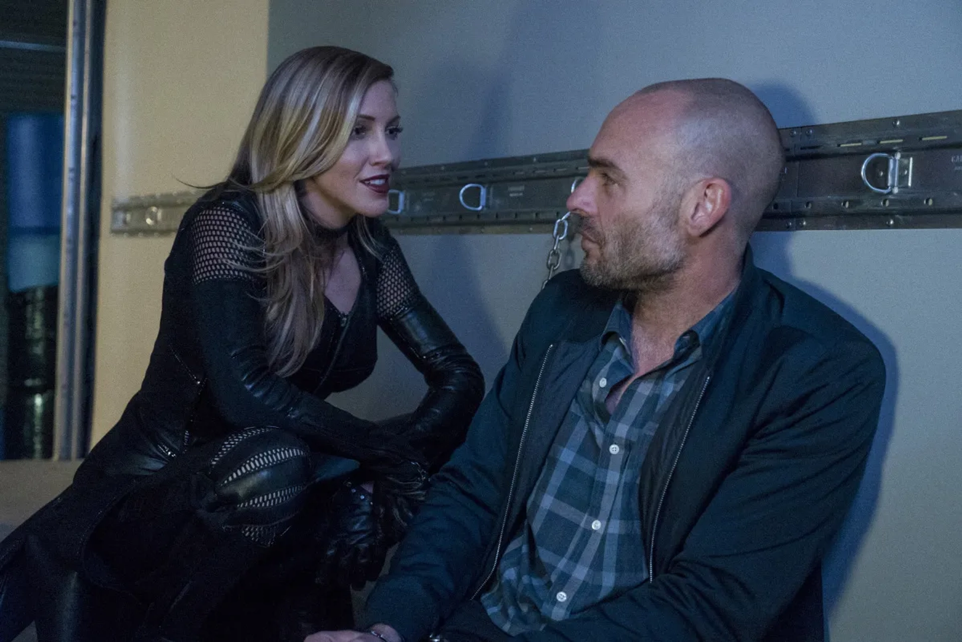 Paul Blackthorne and Katie Cassidy in Arrow (2012)