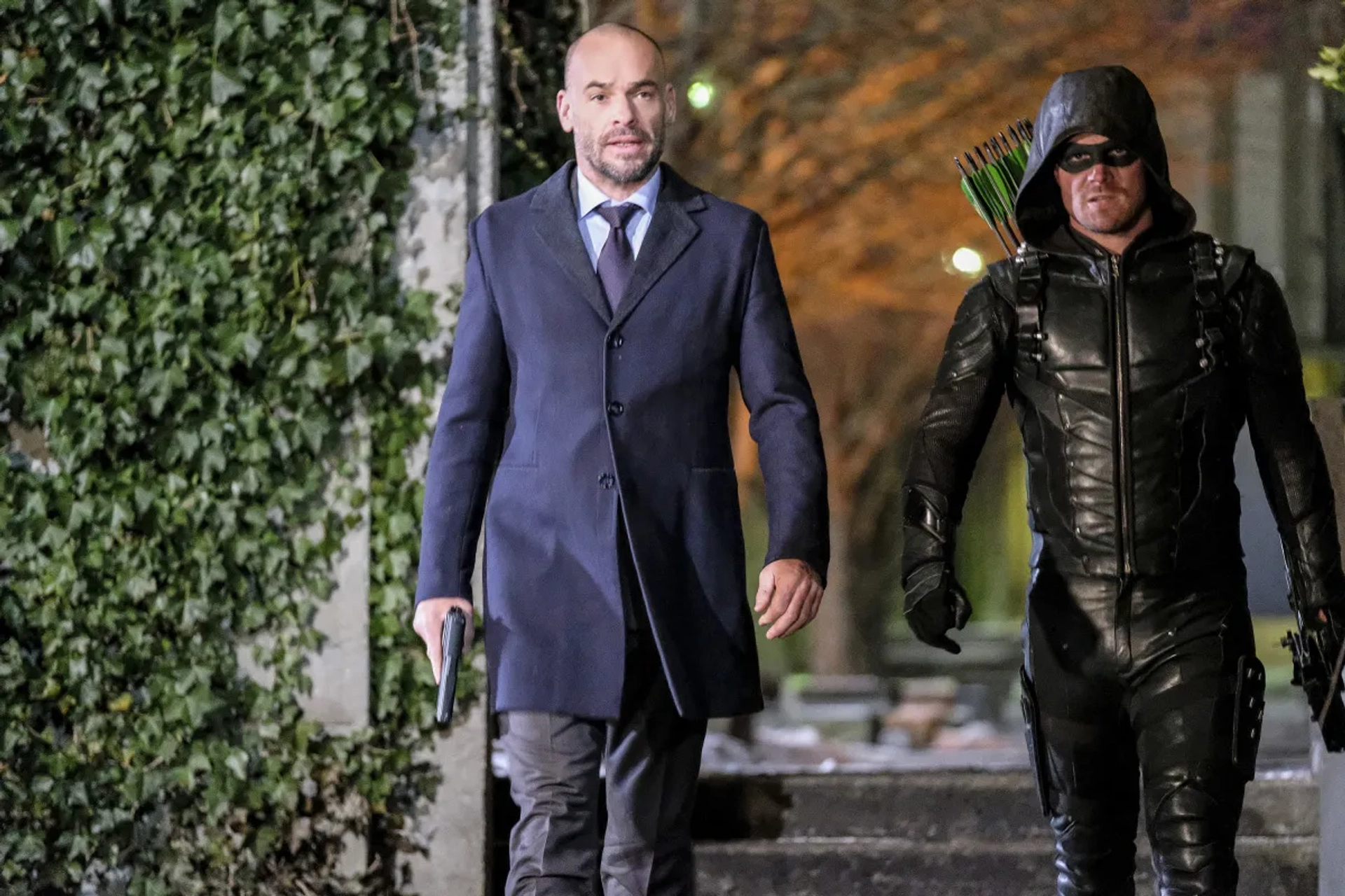 Paul Blackthorne and Stephen Amell in Arrow (2012)