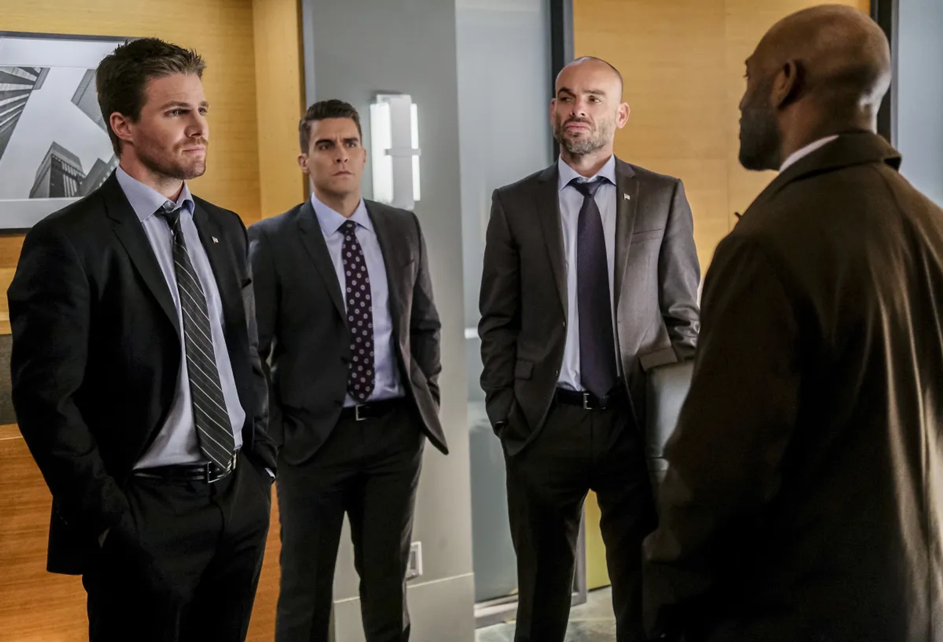 Paul Blackthorne, Adrian Holmes, Stephen Amell, and Josh Segarra in Arrow (2012)