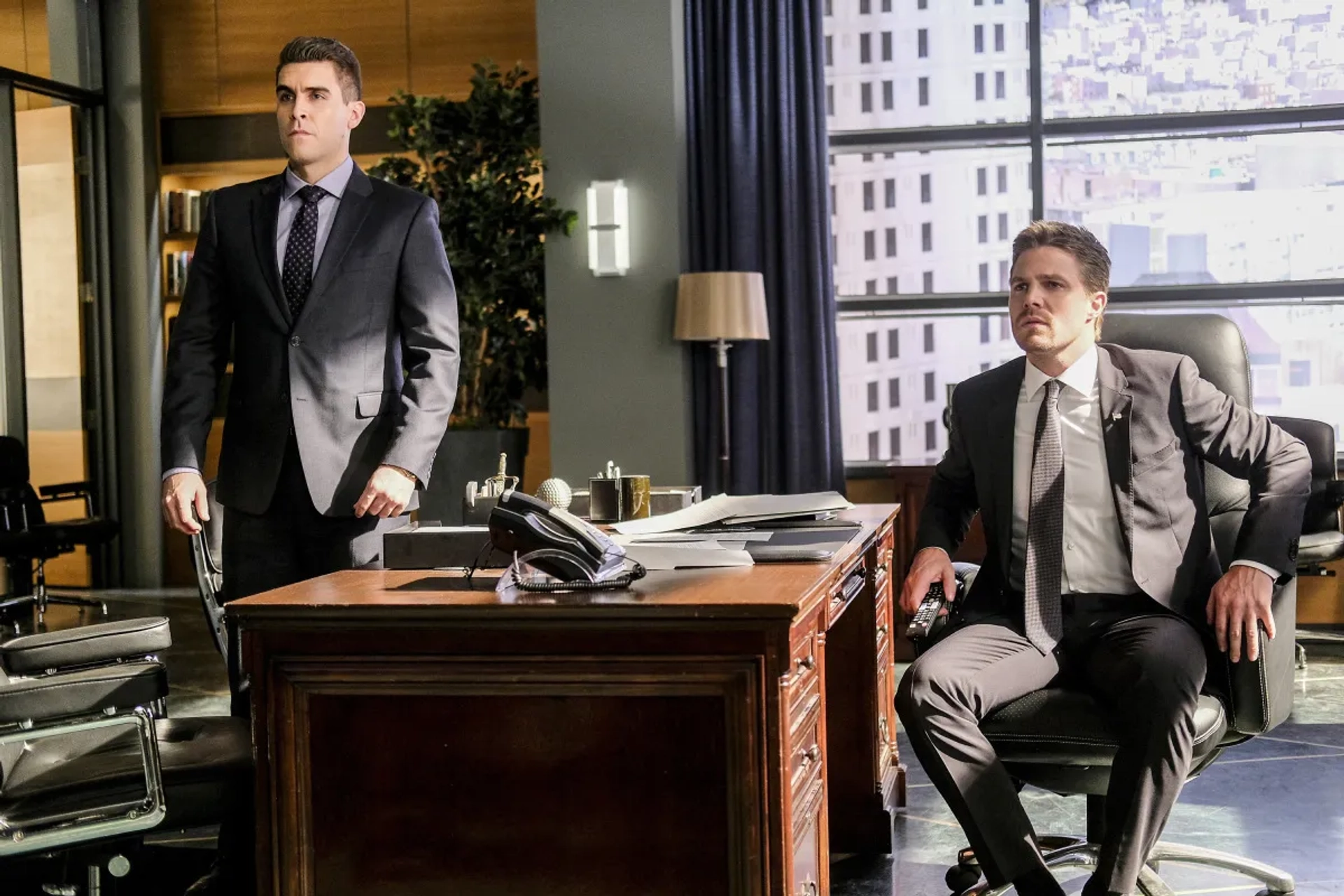 Stephen Amell and Josh Segarra in Arrow (2012)