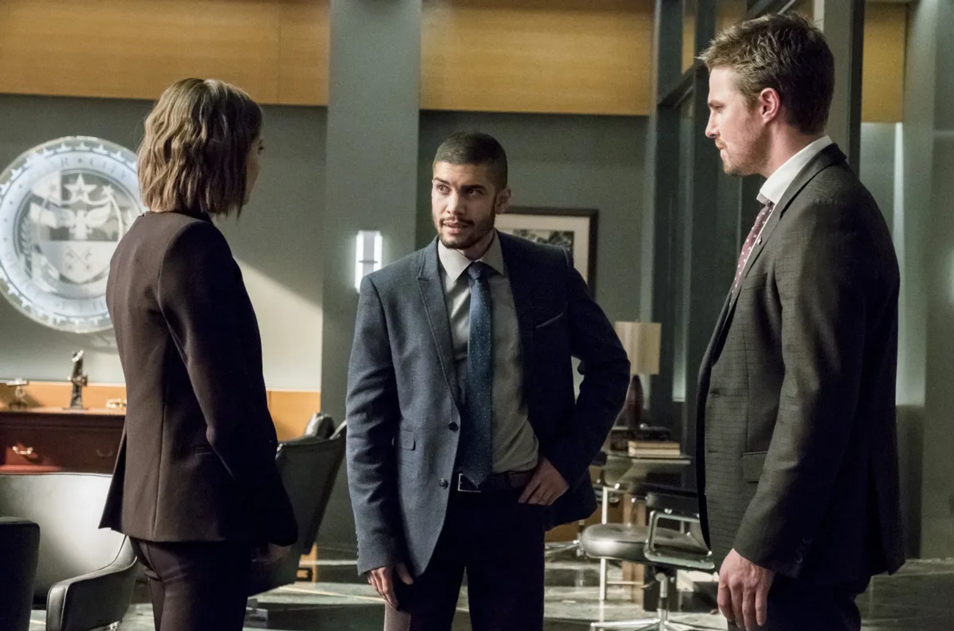 Rick Gonzalez, Willa Holland, and Stephen Amell in Arrow (2012)