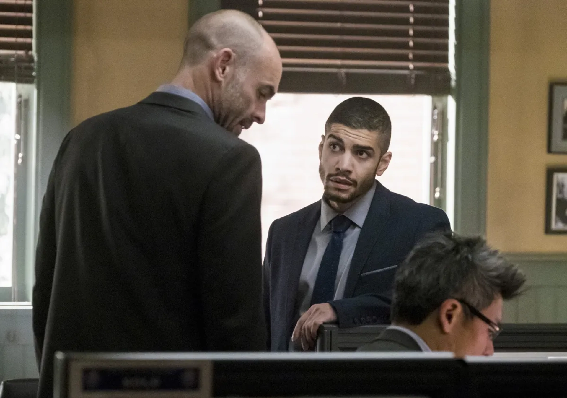 Paul Blackthorne and Rick Gonzalez in Arrow (2012)