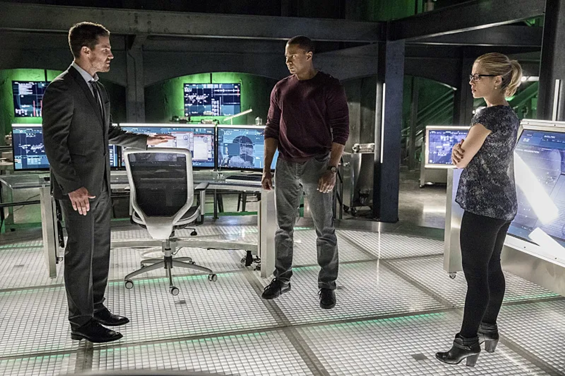 David Ramsey, Stephen Amell, and Emily Bett Rickards in Arrow (2012)