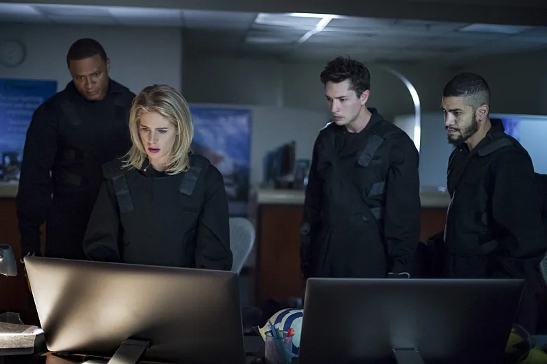 Joe Dinicol, Rick Gonzalez, David Ramsey, and Emily Bett Rickards in Arrow (2012)