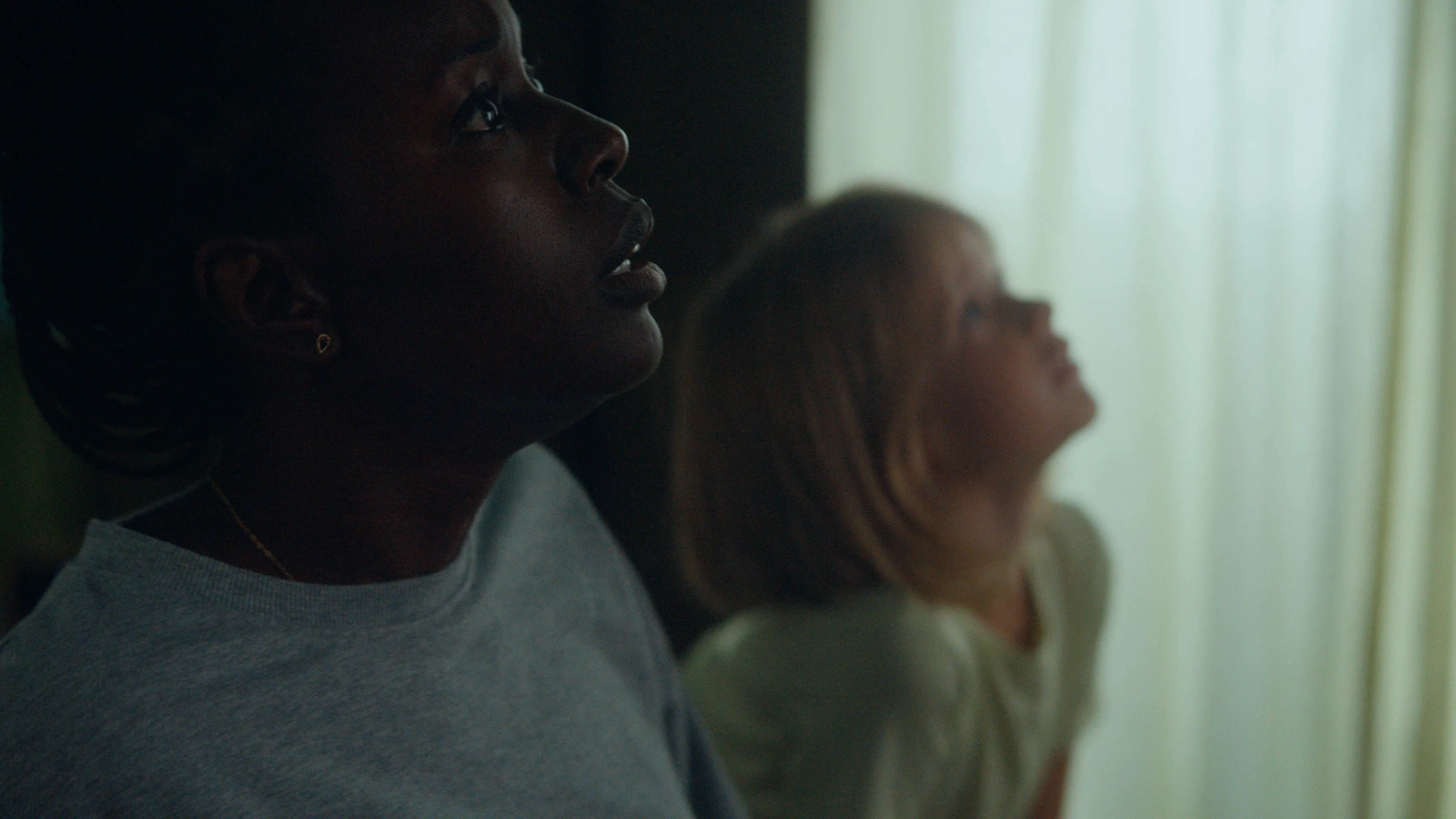 Rose Decker and Anna Diop in Nanny (2022)