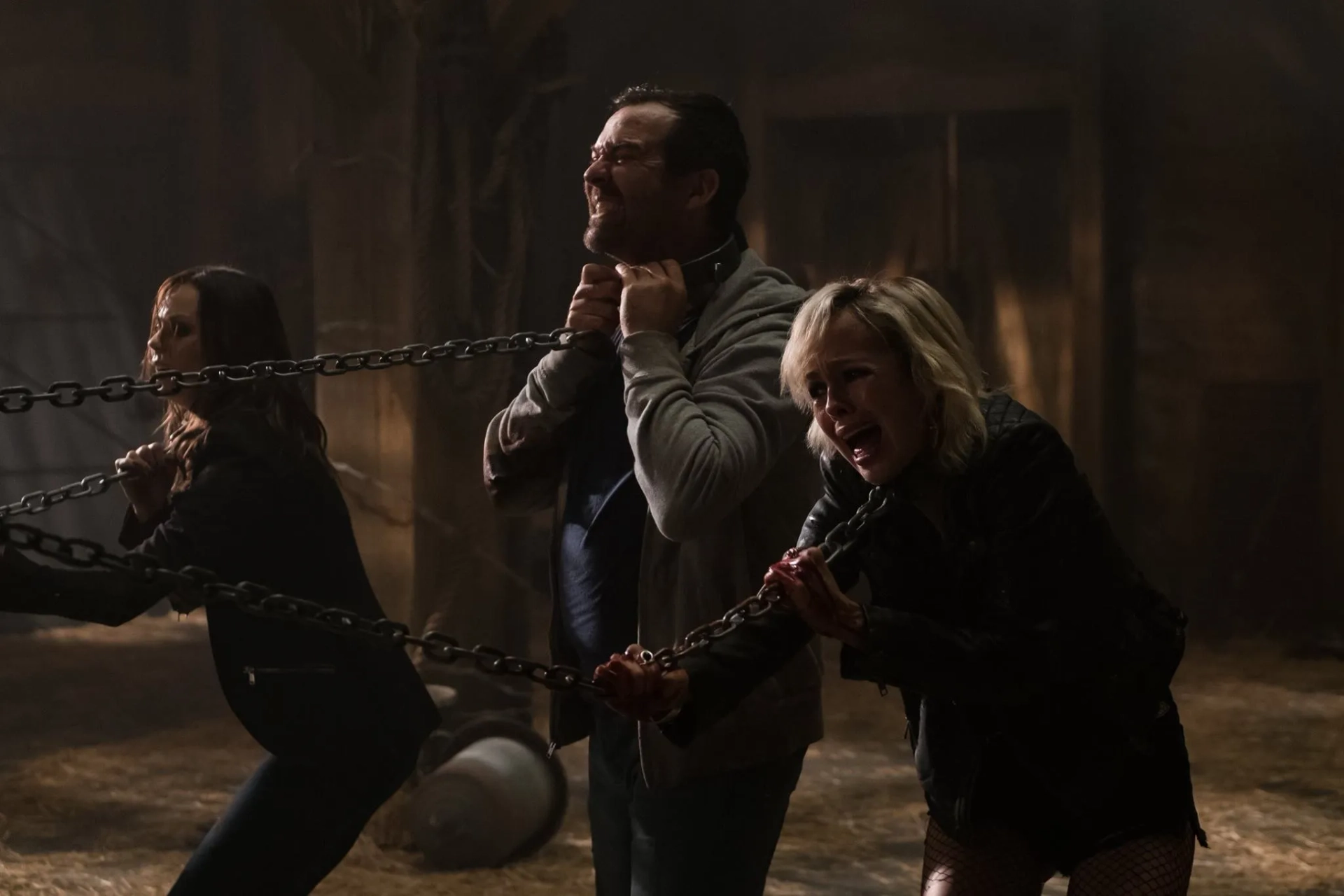 Brittany Allen, Paul Braunstein, and Laura Vandervoort in Jigsaw (2017)