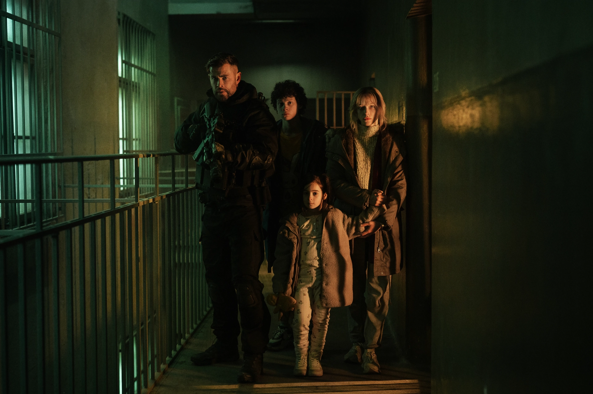 Chris Hemsworth, Mariami Kovziashvili, Marta Kovziashvili, Tinatin Dalakishvili, and Andro Japaridze in Extraction II (2023)