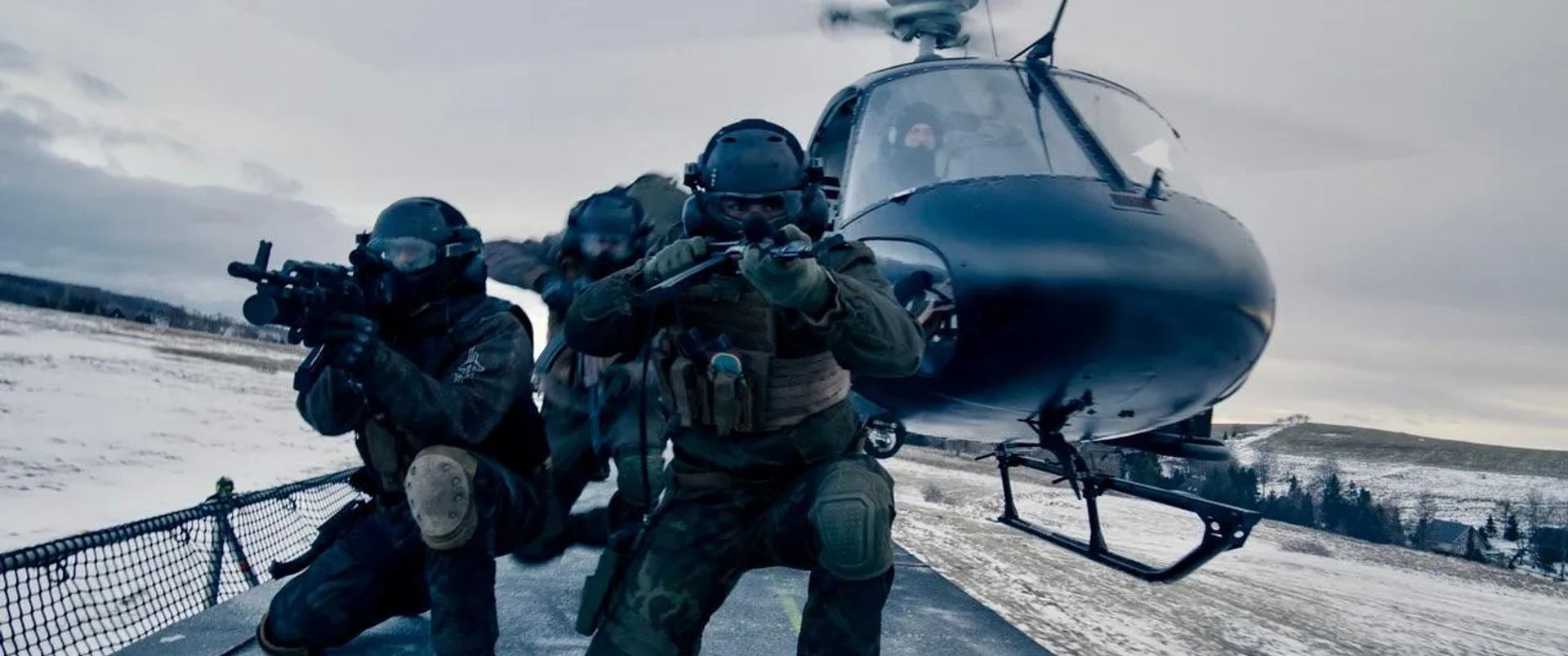 The on camera helicopter stunt team, pictured left to right: RJ Casey, Jordan Le Goueff, Matt LeBorde, and Fred North, flying, for Extraction 2 (2023)