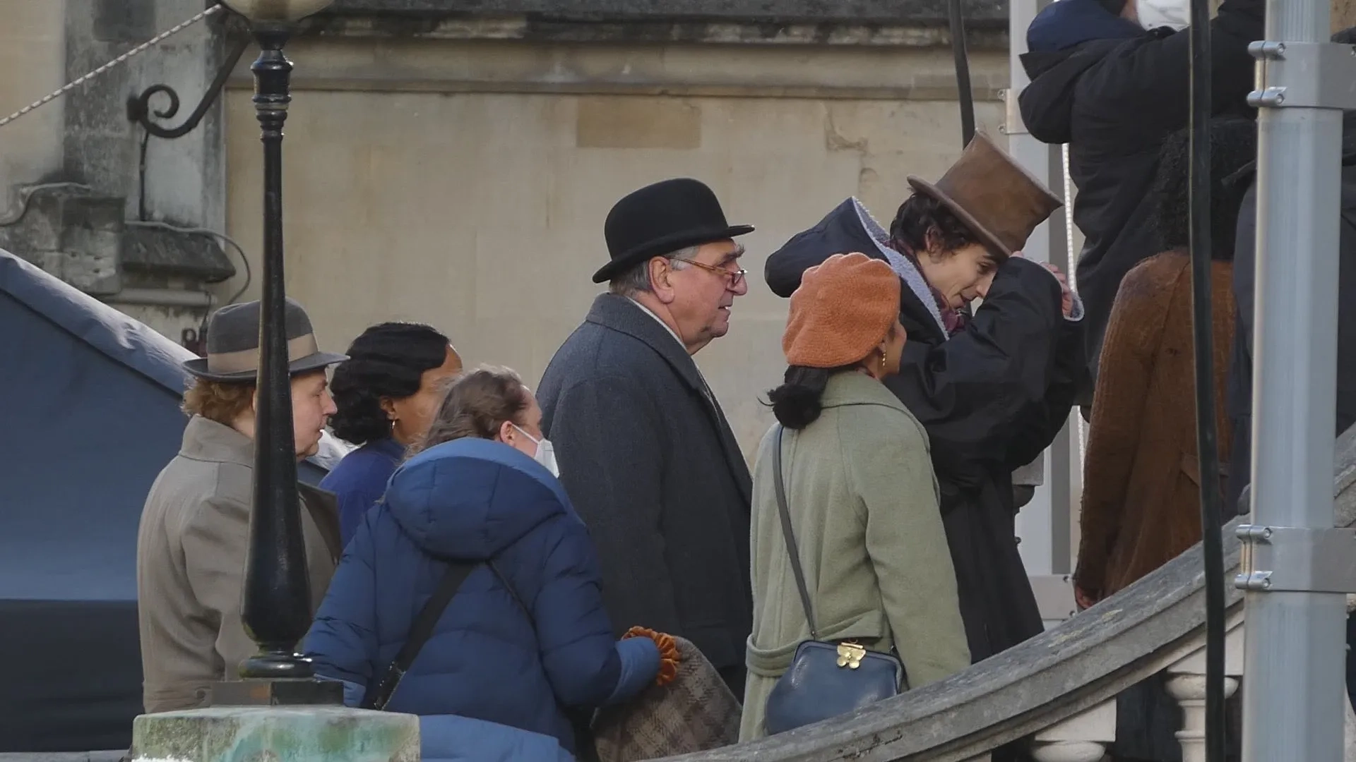 Jim Carter, Rakhee Thakrar, and Timothée Chalamet in Wonka (2023)