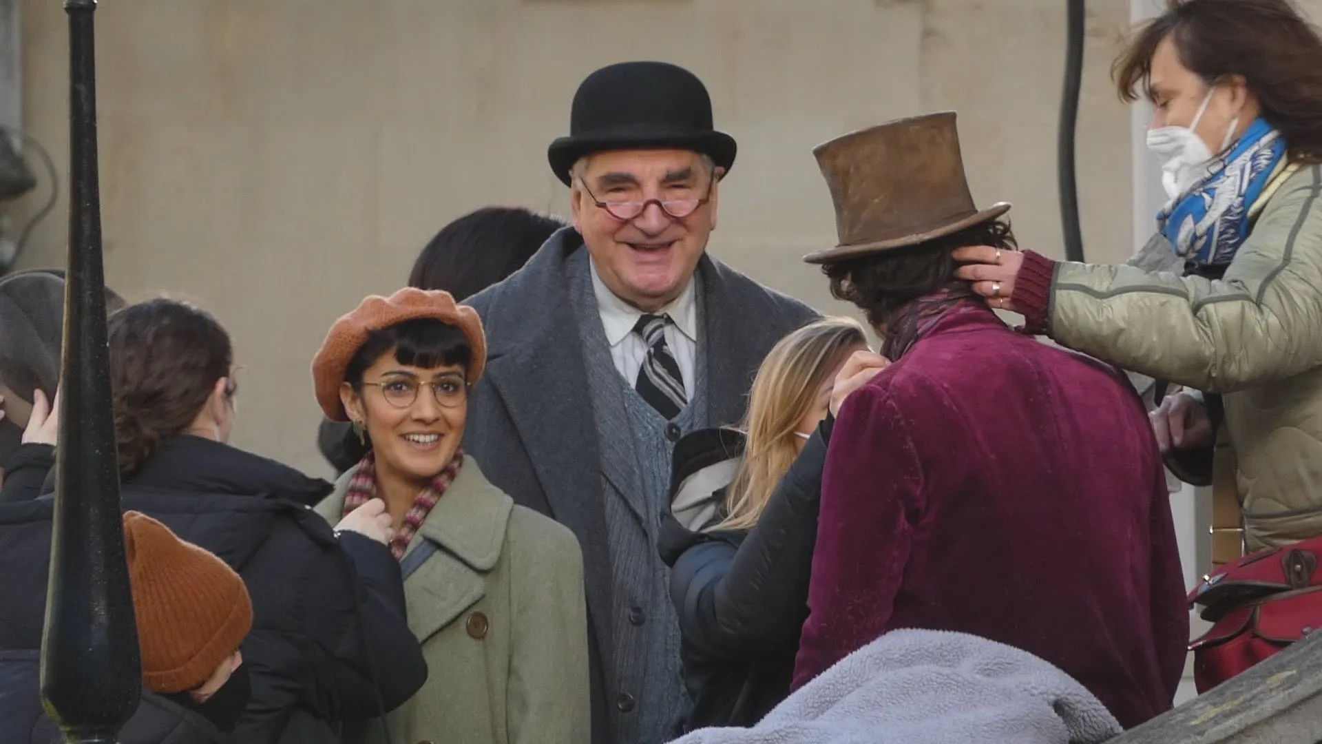 Jim Carter, Rakhee Thakrar, and Timothée Chalamet in Wonka (2023)