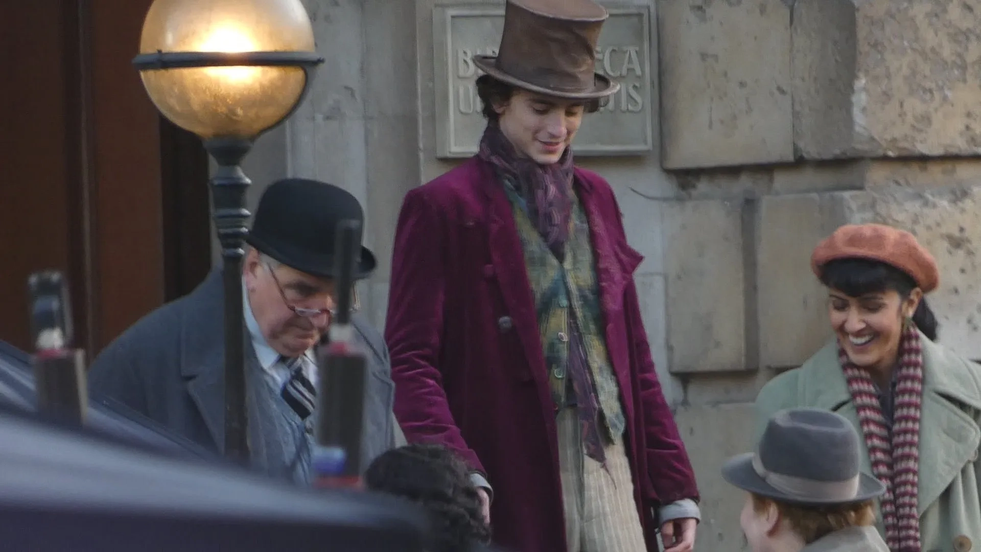 Jim Carter, Rakhee Thakrar, and Timothée Chalamet in Wonka (2023)