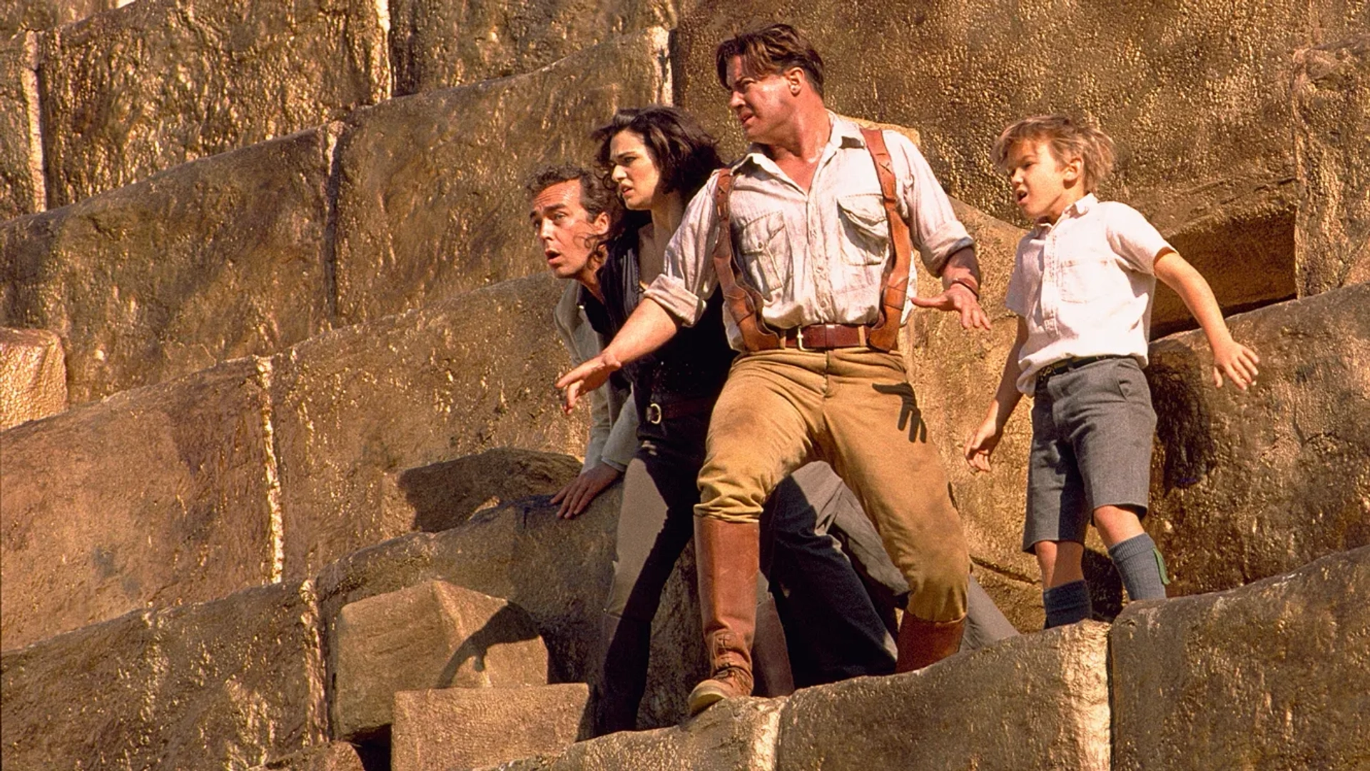 Brendan Fraser, John Hannah, Rachel Weisz, and Freddie Boath in The Mummy Returns (2001)