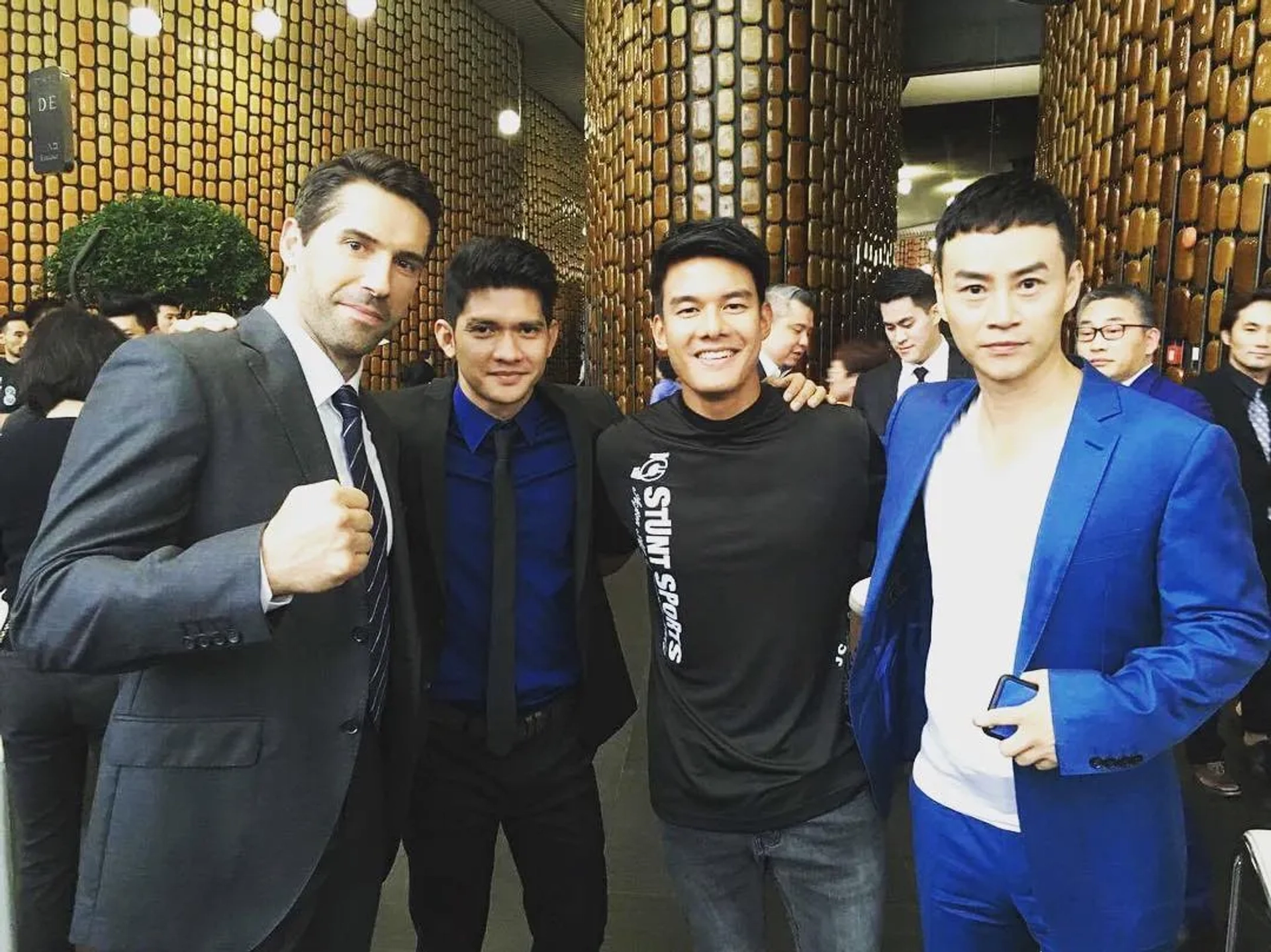 Scott Adkins, Tiger Hu Chen, Andreas Nguyen, and Iko Uwais in Triple Threat (2019)