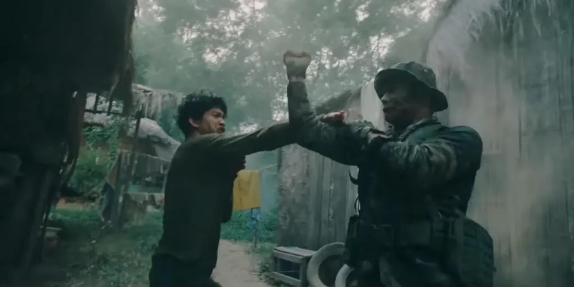 Tiger Hu Chen and Iko Uwais in Triple Threat (2019)