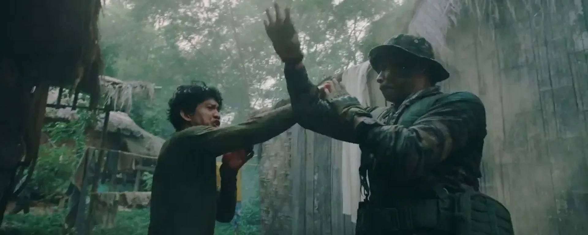 Tiger Hu Chen and Iko Uwais in Triple Threat (2019)