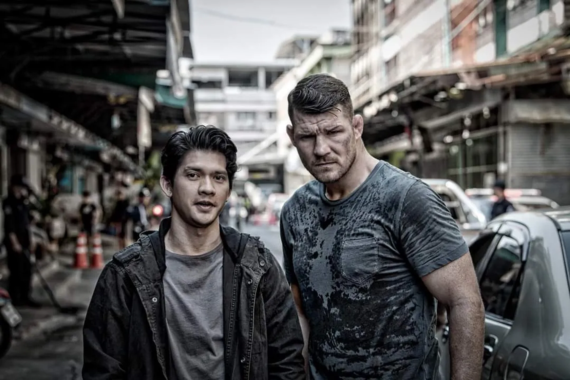 Michael Bisping and Iko Uwais in Triple Threat (2019)