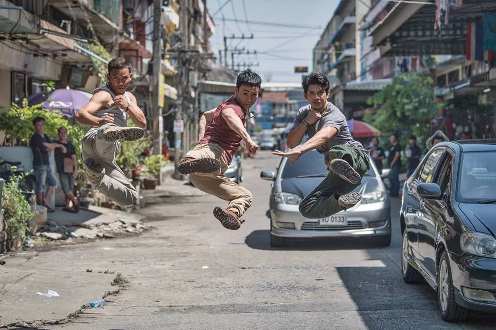 Tiger Hu Chen, Tony Jaa, and Iko Uwais in Triple Threat (2019)