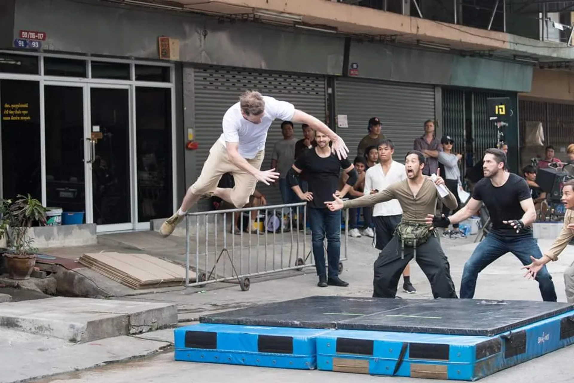 Scott Adkins, Jesse V. Johnson, Tony Jaa, and Kazu Patrick Tang in Triple Threat (2019)