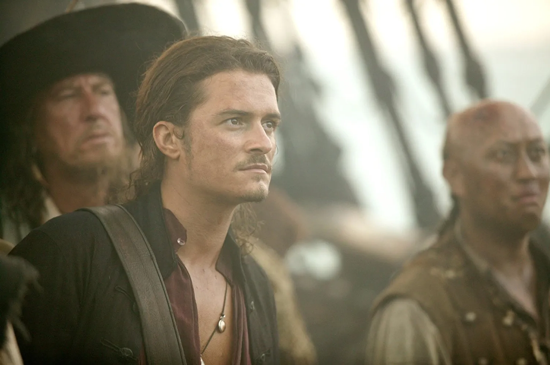 Geoffrey Rush and Orlando Bloom in Pirates of the Caribbean: At World's End (2007)