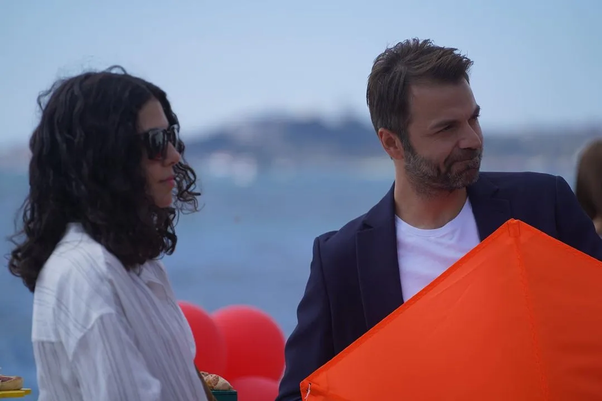 Cemre Ebuzziya and Aziz Caner Inan in If You Love (2023)