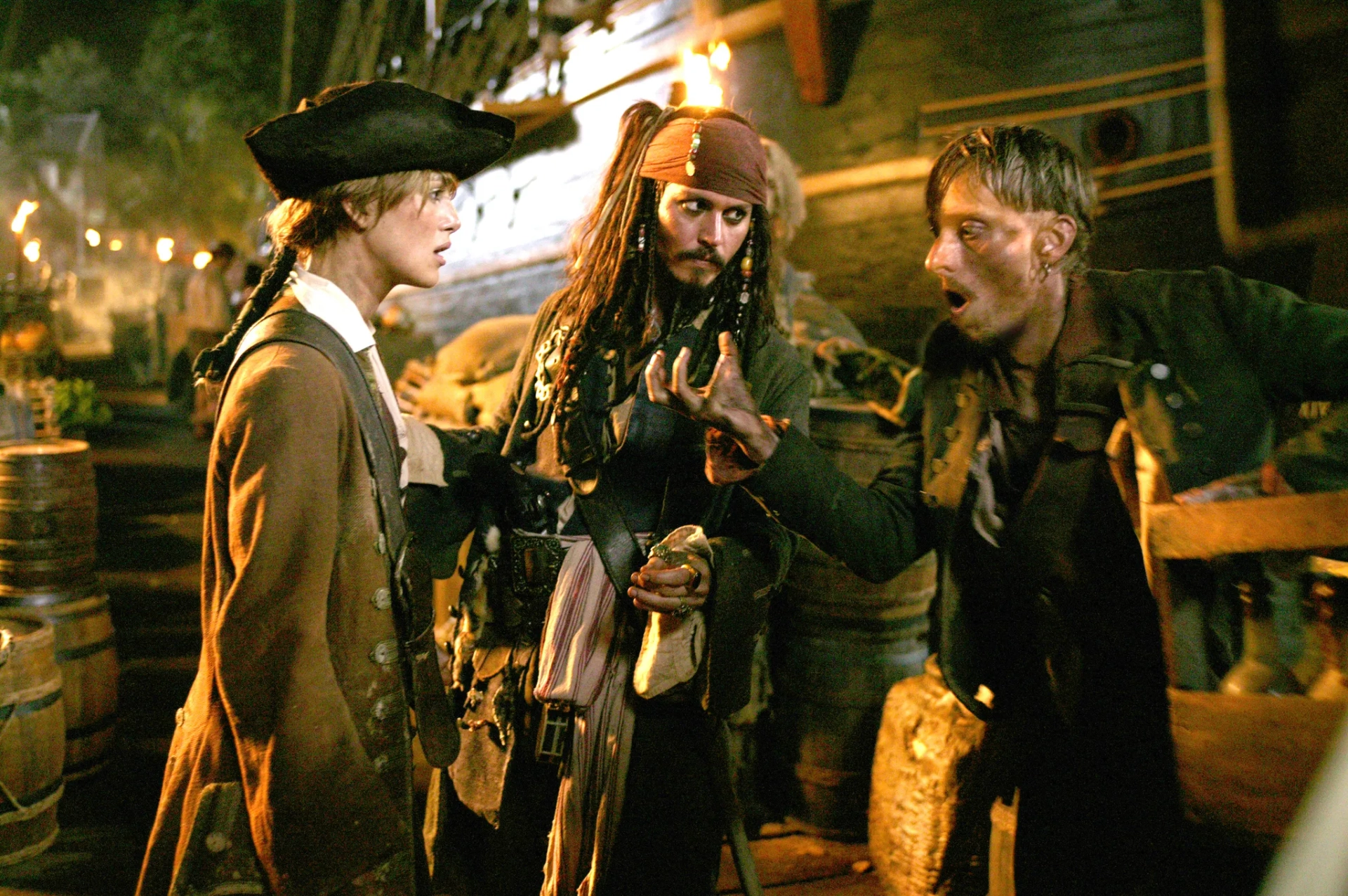 Johnny Depp, Mackenzie Crook, and Keira Knightley in Pirates of the Caribbean: Dead Man's Chest (2006)