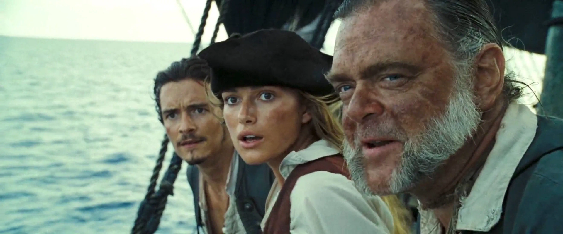 Orlando Bloom, Keira Knightley, and Kevin McNally in Pirates of the Caribbean: Dead Man's Chest (2006)