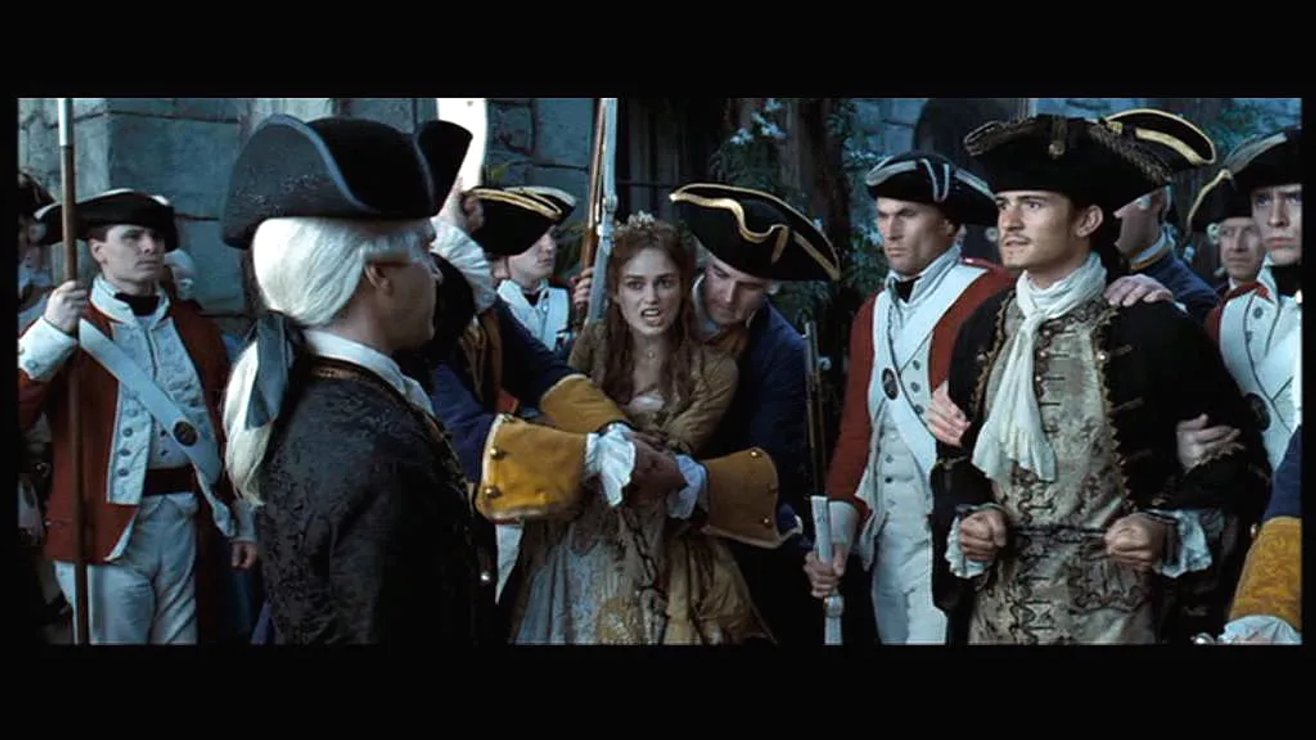 Orlando Bloom, Tom Hollander, Keira Knightley, and Alexander Hall in Pirates of the Caribbean: Dead Man's Chest (2006)