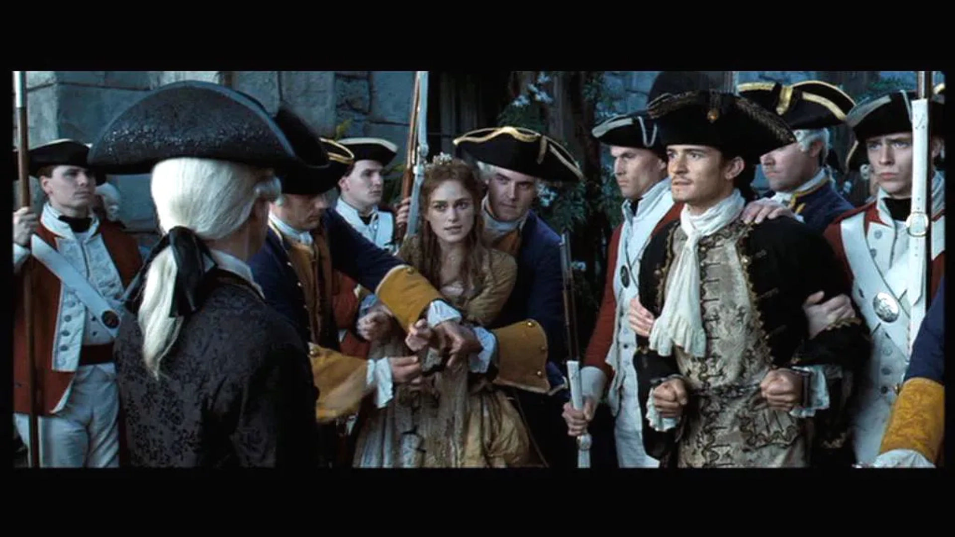 Orlando Bloom, Tom Hollander, Keira Knightley, and Alexander Hall in Pirates of the Caribbean: Dead Man's Chest (2006)