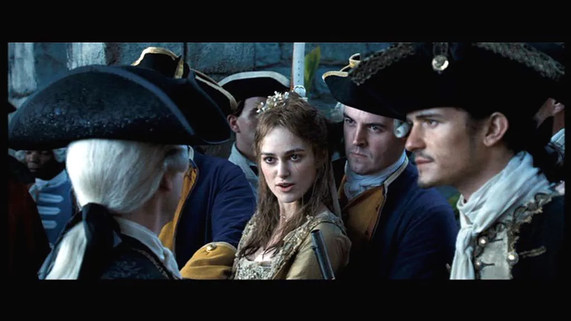 Orlando Bloom, Tom Hollander, Keira Knightley, and Alexander Hall in Pirates of the Caribbean: Dead Man's Chest (2006)