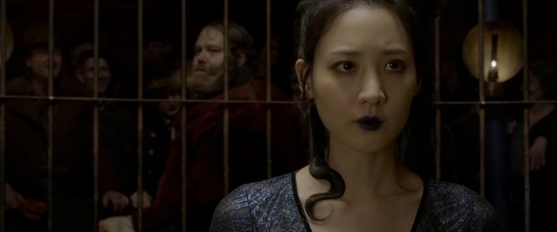 Ólafur Darri Ólafsson and Claudia Kim in Fantastic Beasts: The Crimes of Grindelwald (2018)