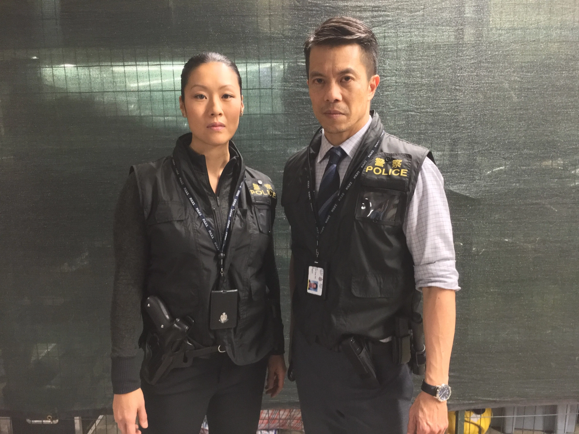 Byron Mann and Elfina Luk in Skyscraper (2018)