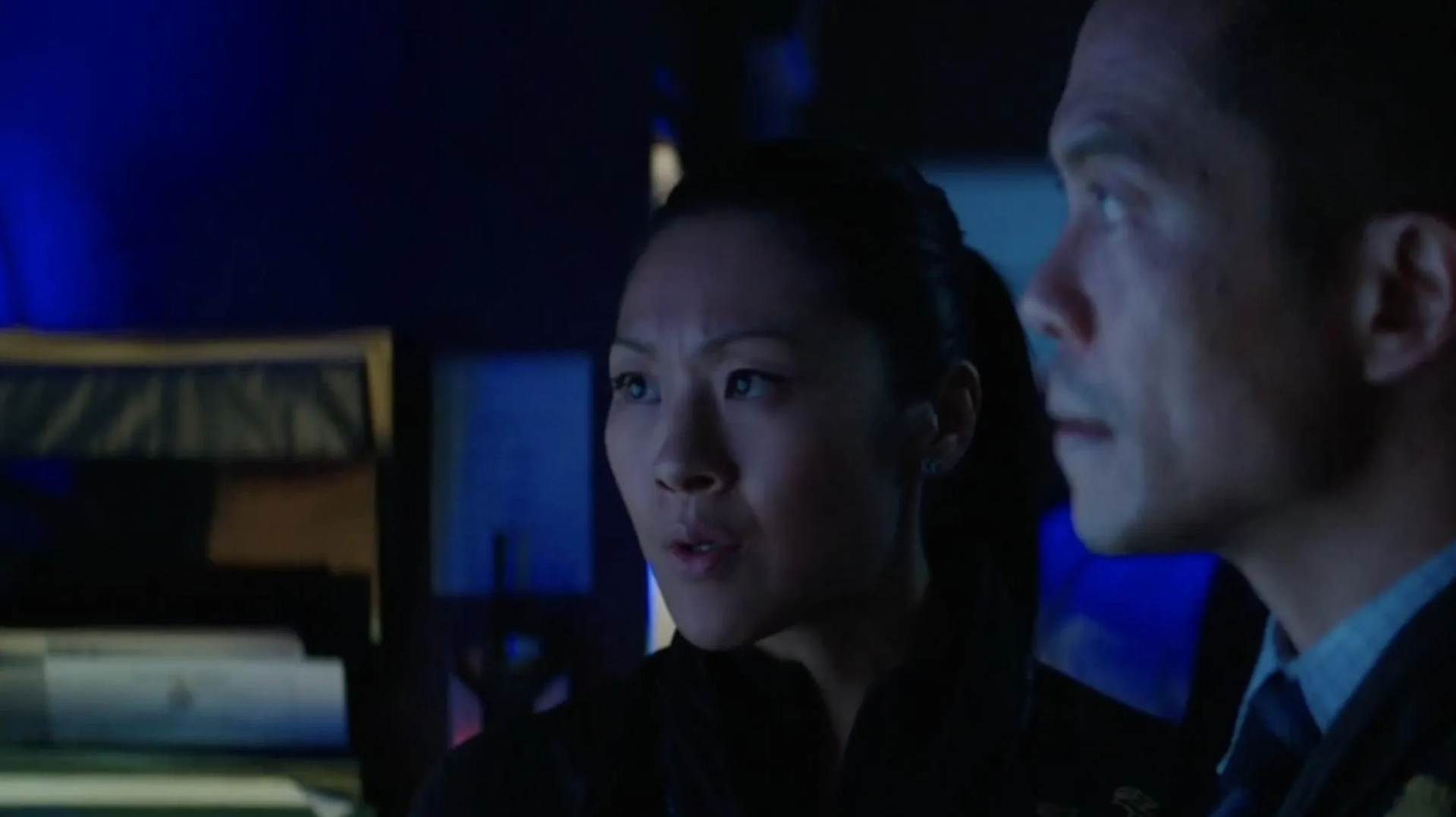 Byron Mann and Elfina Luk in Skyscraper (2018)