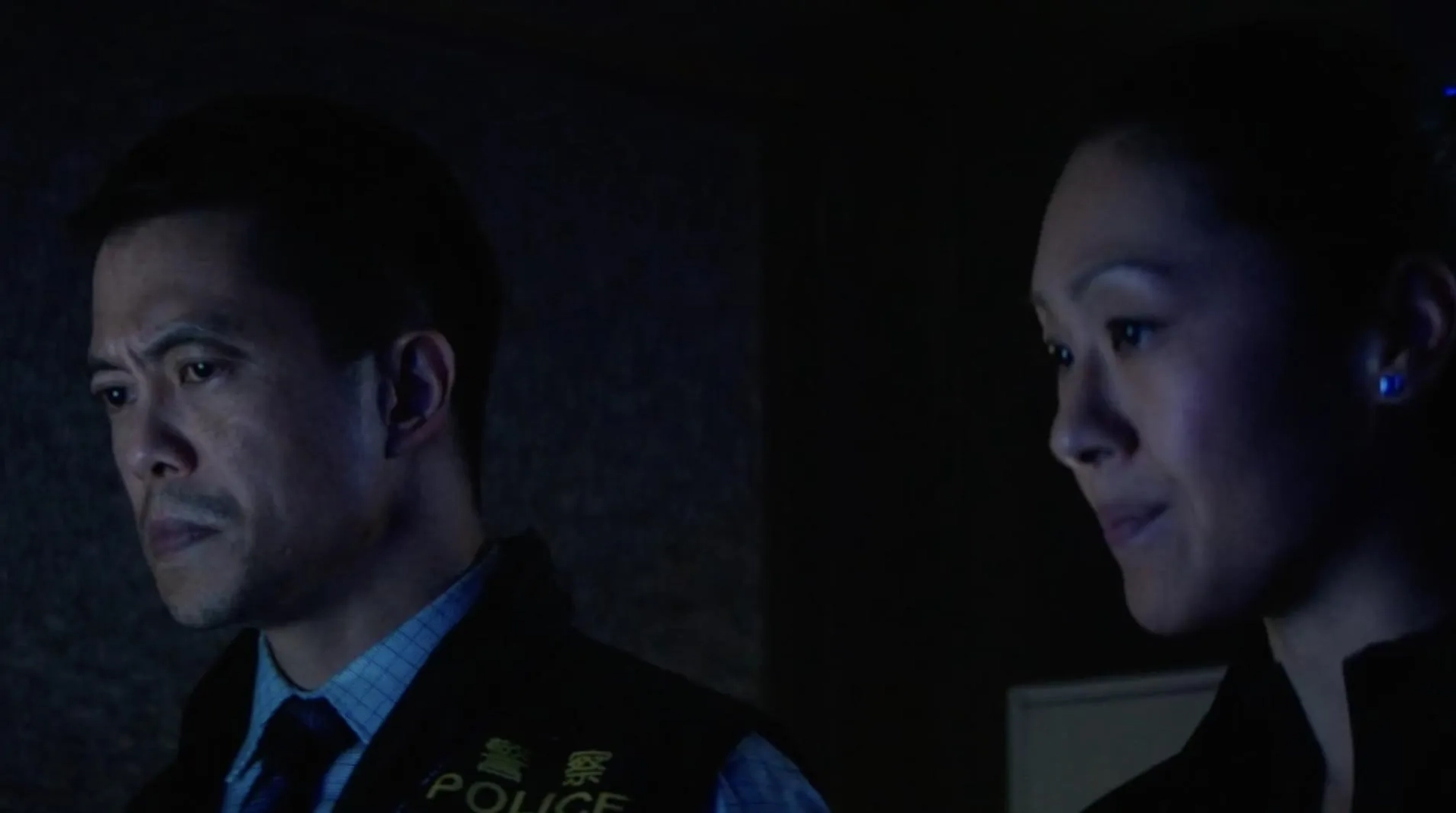 Byron Mann and Elfina Luk in Skyscraper (2018)