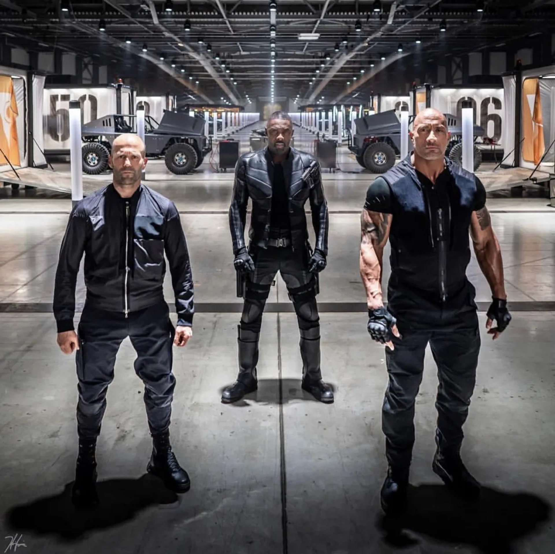 Jason Statham, Idris Elba, and Dwayne Johnson in Fast & Furious Presents: Hobbs & Shaw (2019)