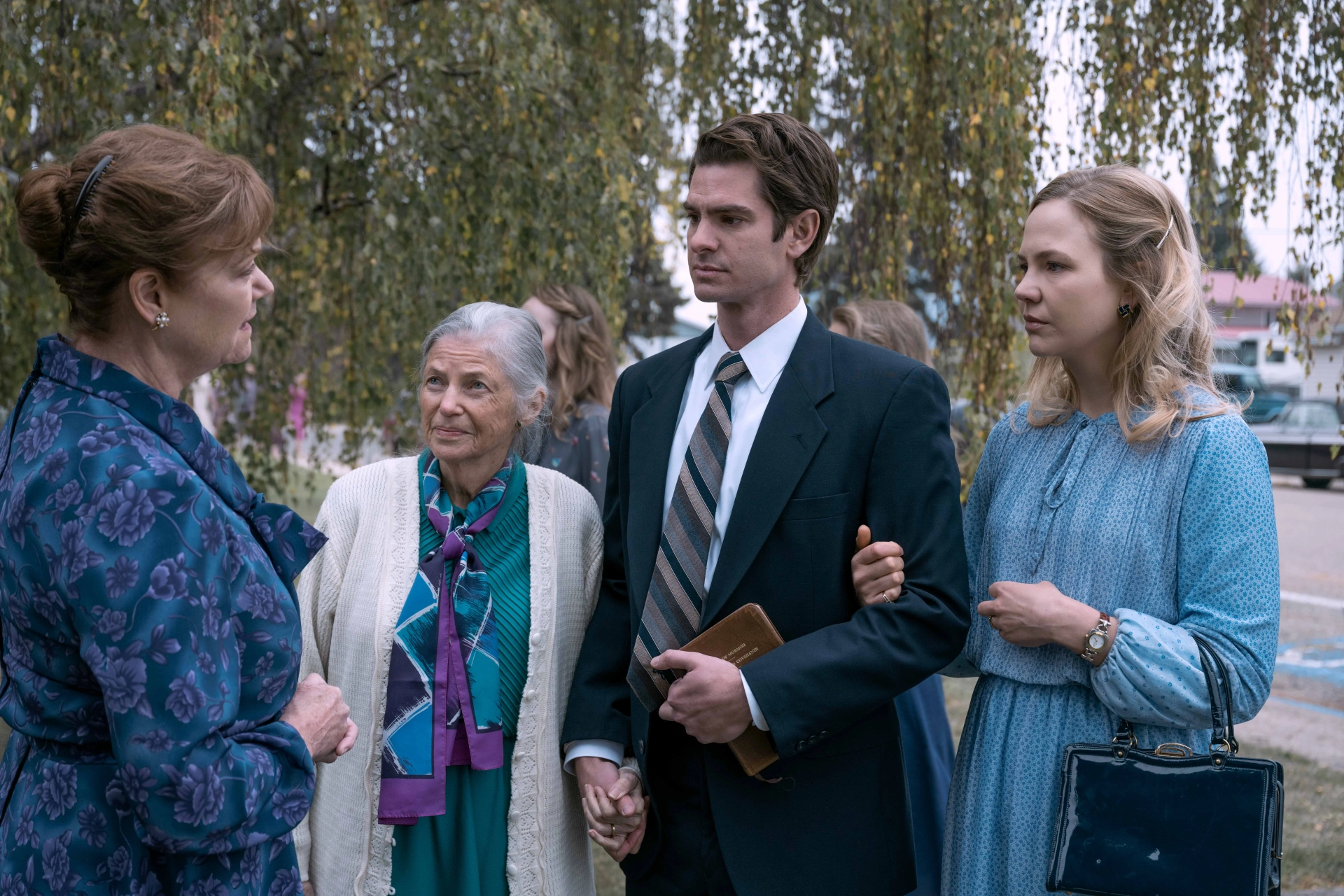 Gillian Barber, Sandra Seacat, Andrew Garfield, and Adelaide Clemens in Under the Banner of Heaven: Church and State (2022)