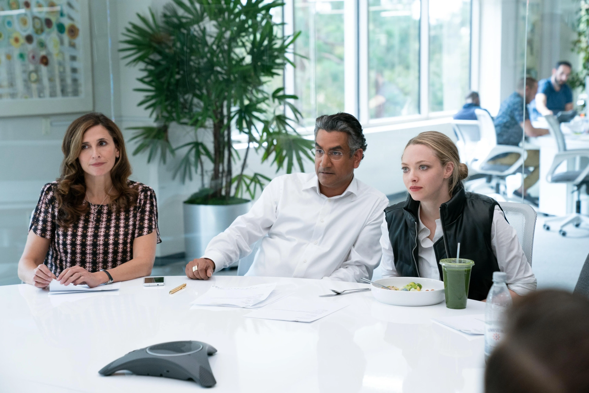 Naveen Andrews, Amanda Seyfried, and Michaela Watkins in The Dropout (2022)