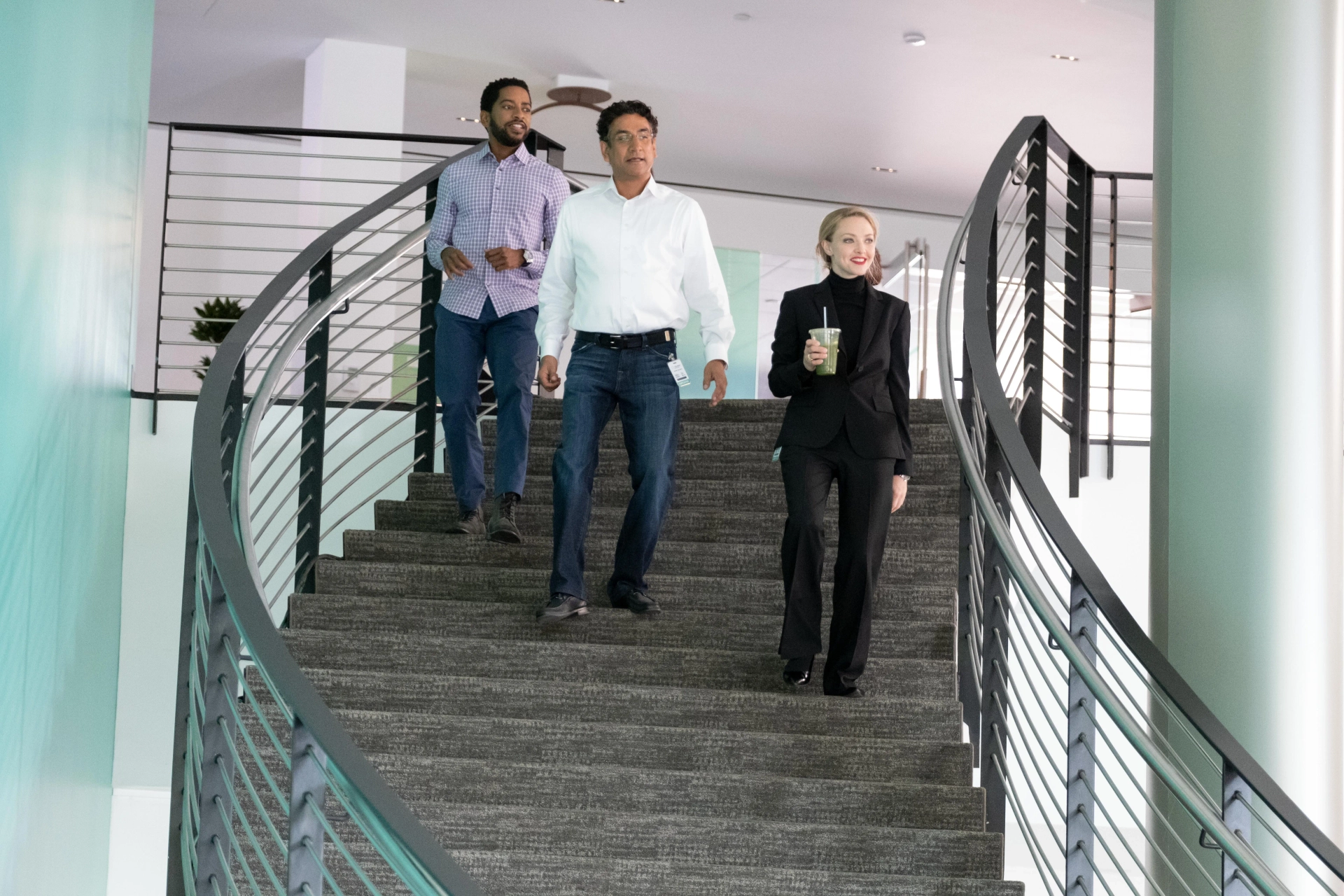 Naveen Andrews, Amanda Seyfried, and Shaun J. Brown in The Dropout (2022)