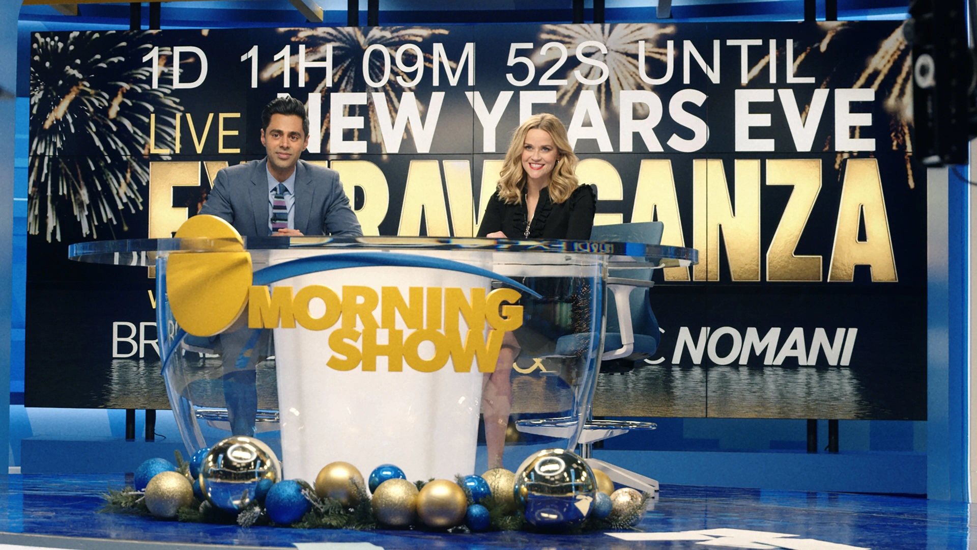 Reese Witherspoon and Hasan Minhaj in The Morning Show: My Least Favorite Year (2021)